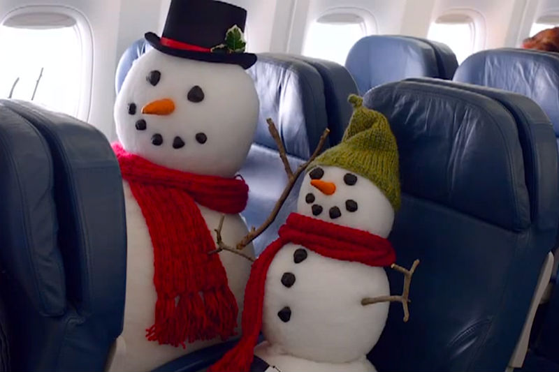 Snowmen in airplane seats
